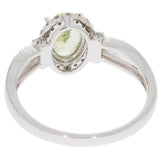 Elegant Green Peridot 14K White Gold Ring showcasing diamond accents, viewed from the back to highlight craftsmanship.